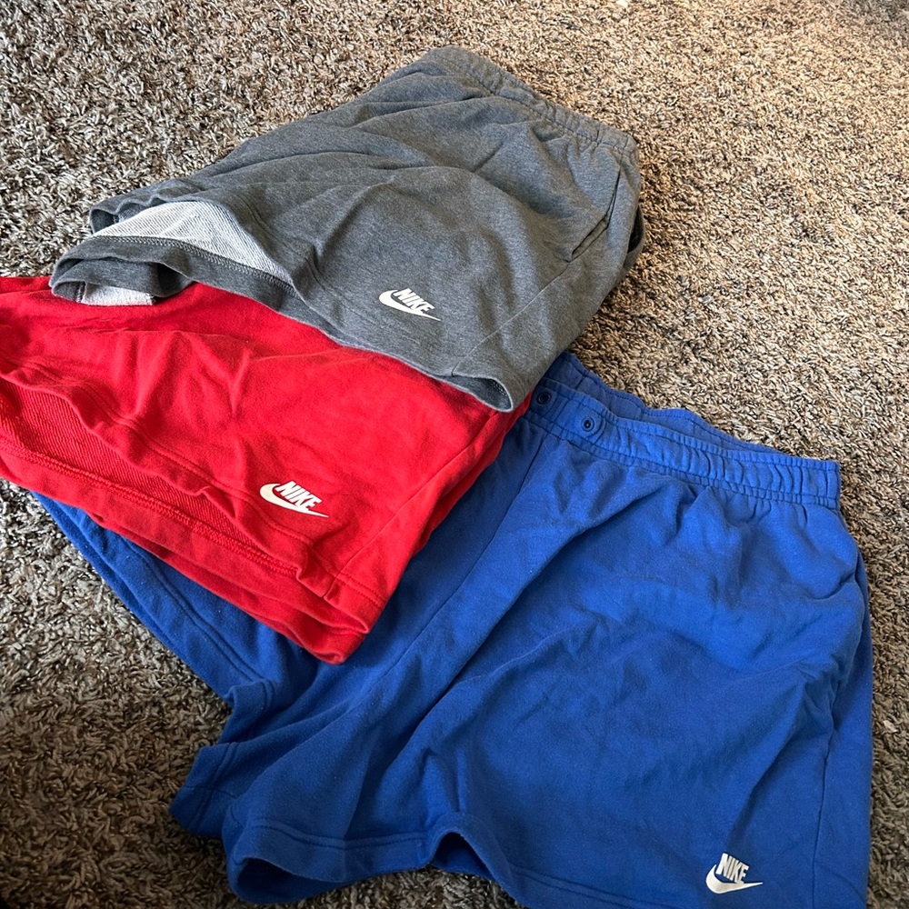 Nike woman’s shorts  - Red, Blue, and Gray